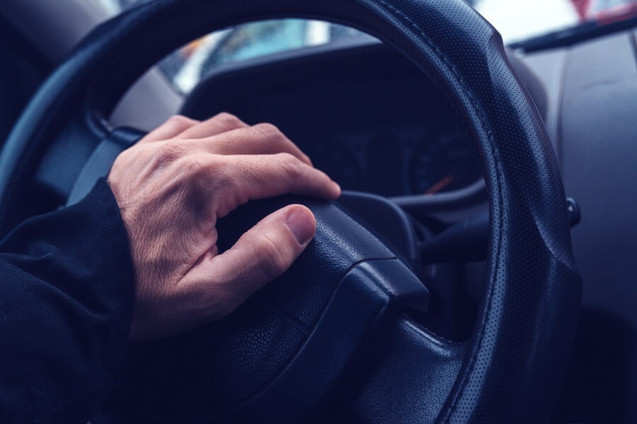 male hand honking the car