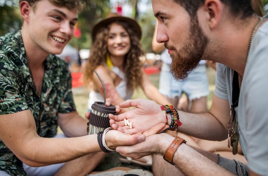 drug dealing with a supplier in a festival