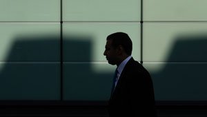 white-collar-a-man-walking-at-the-building