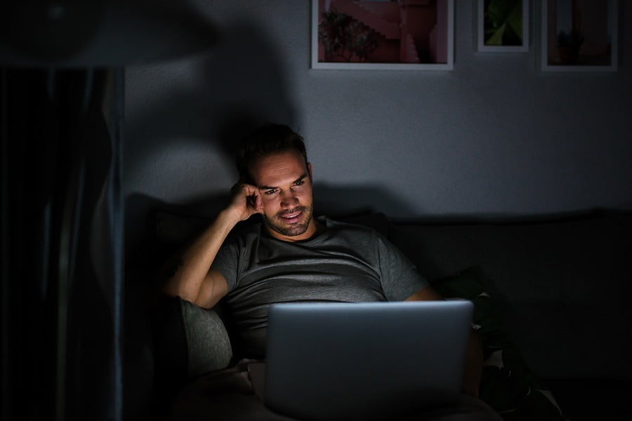 Man privately using his computer