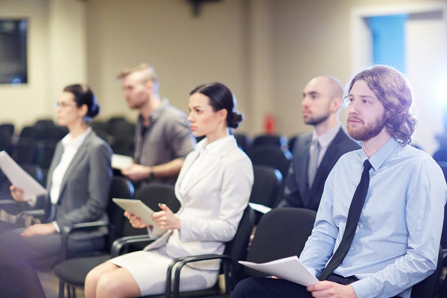 Employees attending a conference