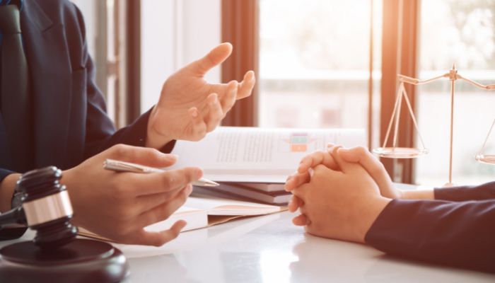 man with talking with lawyer suit